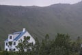 Landscape of farm house near Reynisfjara Black sand Beach Vik South Iceland