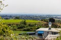 Landscape of a farm with livestock grazing in the green field Royalty Free Stock Photo