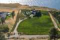 Landscape with farmer`s house at Okanagan lake on sunny summer day Royalty Free Stock Photo