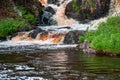 Landscape with fast rapids of a small waterfall