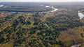 Landscape of the fields, trees and river durig autumn time