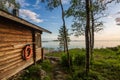 Landscape with finnish sauna building and the gulf of Bothnia on background