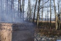 Landscape with firing of wood fire kiln is part of process for black pottery