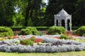 Landscape with flower beds and a gazebo