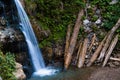 landscape flowing fresh cool blue water of waterfall in mountains Royalty Free Stock Photo