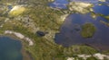 Landscape of the forest-tundra, aerial view, traces of caterpillar equipment on the surface of tundra vegetation, nature