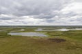 Landscape of the forest-tundra and the sandy river bank, photo from quadrocopter, bird`s eye view. Arctic Circle, Yamal, reind