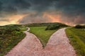 landscape of fork in the road at storm weather, concept of insecurity of future Royalty Free Stock Photo