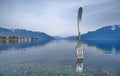 A landscape of the Fork, a stainless steel fork in front of the Alimentarium museum on the shore of Lake Geneva Lac Leman.