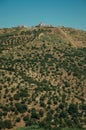 Landscape with fortress of on top of hill and small farms Royalty Free Stock Photo