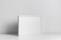 Landscape frame in white minimalistic interior. Blank frame mockup for artwork, print or photo presentation Royalty Free Stock Photo