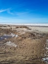 Landscape of frozen Baltic sea and beach covered with ice and snow Royalty Free Stock Photo