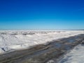Landscape of frozen Baltic sea and beach covered with ice and snow Royalty Free Stock Photo