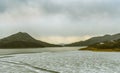 Frozen lake on a cloudy winter morning. Royalty Free Stock Photo