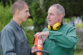 landscape gardeners talking about machines Royalty Free Stock Photo