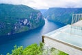 Landscape of Geirangerfjord and Seven Sisters Waterfall near small village of Geiranger. View from Eagles Road viewpoint. Norway Royalty Free Stock Photo
