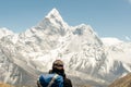 Landscape with girl, high mountains with snowy peaks, path, blue sky in Nepal. Travel. Vintage style. Nature Royalty Free Stock Photo