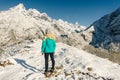 Landscape with girl, high mountains with snowy peaks, path, blue sky in Nepal. Travel. Vintage style. Nature Royalty Free Stock Photo