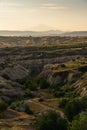 Landscape of Goreme ancient town in a morning sunrise. Cappadocia plateau in middle of Anatolia region in Turkey