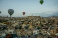 Landscape of Goreme at dawn. Hot air balloons over mountain landscape in Cappadocia, Goreme, Turkey. Aerial view from air balloon Royalty Free Stock Photo