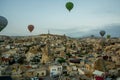 Landscape of Goreme at dawn. Hot air balloons over mountain landscape in Cappadocia, Goreme, Turkey. Aerial view from air balloon Royalty Free Stock Photo