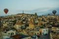 Landscape of Goreme at dawn. Hot air balloons over mountain landscape in Cappadocia, Goreme, Turkey. Aerial view from air balloon Royalty Free Stock Photo