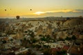 Landscape of Goreme at dawn. Hot air balloons over mountain landscape in Cappadocia, Goreme, Turkey. Aerial view from air balloon Royalty Free Stock Photo