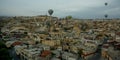 Landscape of Goreme at dawn. Hot air balloons over mountain landscape in Cappadocia, Goreme, Turkey. Aerial view from air balloon Royalty Free Stock Photo