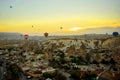 Landscape of Goreme at dawn. Hot air balloons over mountain landscape in Cappadocia, Goreme, Turkey. Aerial view from air balloon Royalty Free Stock Photo