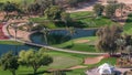 Landscape of green golf course with trees aerial timelapse. Dubai, UAE Royalty Free Stock Photo