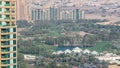 Landscape of green golf course with trees aerial timelapse. Dubai, UAE Royalty Free Stock Photo