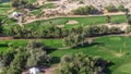 Landscape of green golf course with trees aerial timelapse. Dubai, UAE Royalty Free Stock Photo