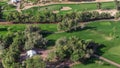 Landscape of green golf course with trees aerial timelapse. Dubai, UAE Royalty Free Stock Photo