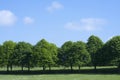 Landscape of green grass field with beautiful blue sky in hot sunny day, Beautiful view day time view at countryside in England in Royalty Free Stock Photo