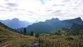 Landscape, green meadows and alps.