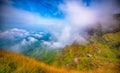 Landscape of Green mountains and beautiful sky clouds under the blue sky, Dramatic moving cloud in nature landscape, Sunshine