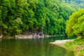 landscape of a green valley with river in spring Royalty Free Stock Photo