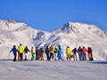 Landscape of a group of skiers gathered on a snowy mountain in St Moritz, Switzerland