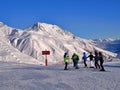 Landscape of a group of skiers gathered on a snowy mountain in St Moritz, Switzerland