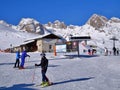 Landscape of a group of skiers gathered on a snowy mountain in St Moritz, Switzerland