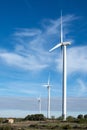 Landscape of group of windmills on line