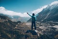 Landscape with happy girl, mountains, blue sky with clouds Royalty Free Stock Photo