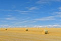 Landscape of hay bales on the prairie with a big blue sky Royalty Free Stock Photo