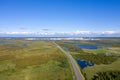 Landscape from a height with the city of Nadym tundra in the summer among the swamps of North Siberia