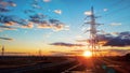 Landscape: High voltage electric tower on sunset background, road, blue sky and clouds Royalty Free Stock Photo