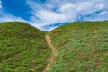 Landscape with hiking path uphill to heaven