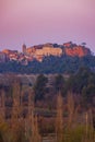 Landscape with historic ocher village Roussillon, Provence, Luberon, Vaucluse, France Royalty Free Stock Photo