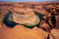 Landscape of Horseshoe Bend with sunrise and reflecting surface of Colorado River near Grand Canyon. Royalty Free Stock Photo