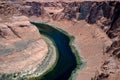 Landscape of Horseshoe Bend with sunrise and reflecting surface of Colorado River near Grand Canyon. Royalty Free Stock Photo