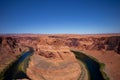 Landscape of Horseshoe Bend with sunrise and reflecting surface of Colorado River near Grand Canyon. Royalty Free Stock Photo